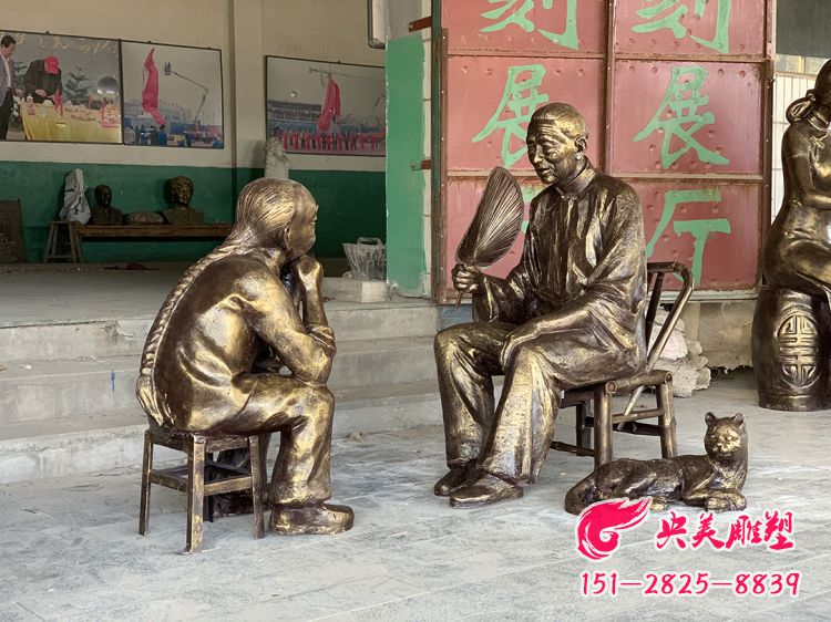 老奶奶讲故事情景雕塑-玻璃钢仿铜民俗人物雕塑图片