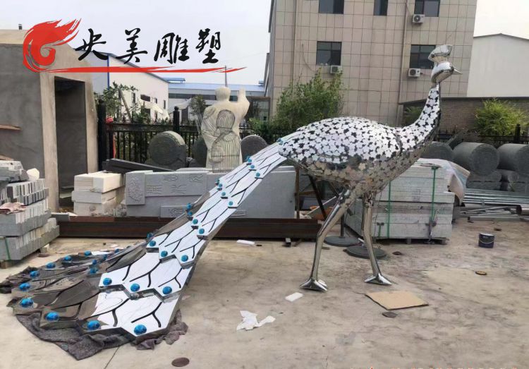 广场不锈钢镂空孔雀雕塑图片 广场不锈钢镂空孔雀雕塑图片