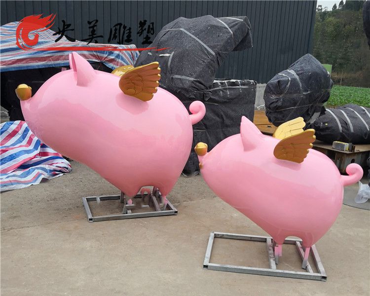 商场玻璃钢彩绘卡通飞猪雕塑图片 商场玻璃钢彩绘卡通飞猪雕塑图片