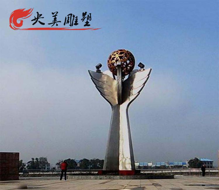 广场摆放不锈钢鱼尾镂空球雕塑图片 广场摆放不锈钢鱼尾镂空球雕塑图片