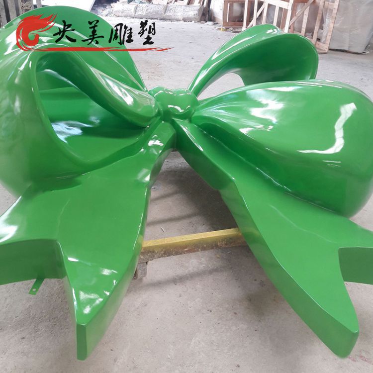 游乐场店铺美陈装饰摆件玻璃钢绿色蝴蝶结雕塑图片